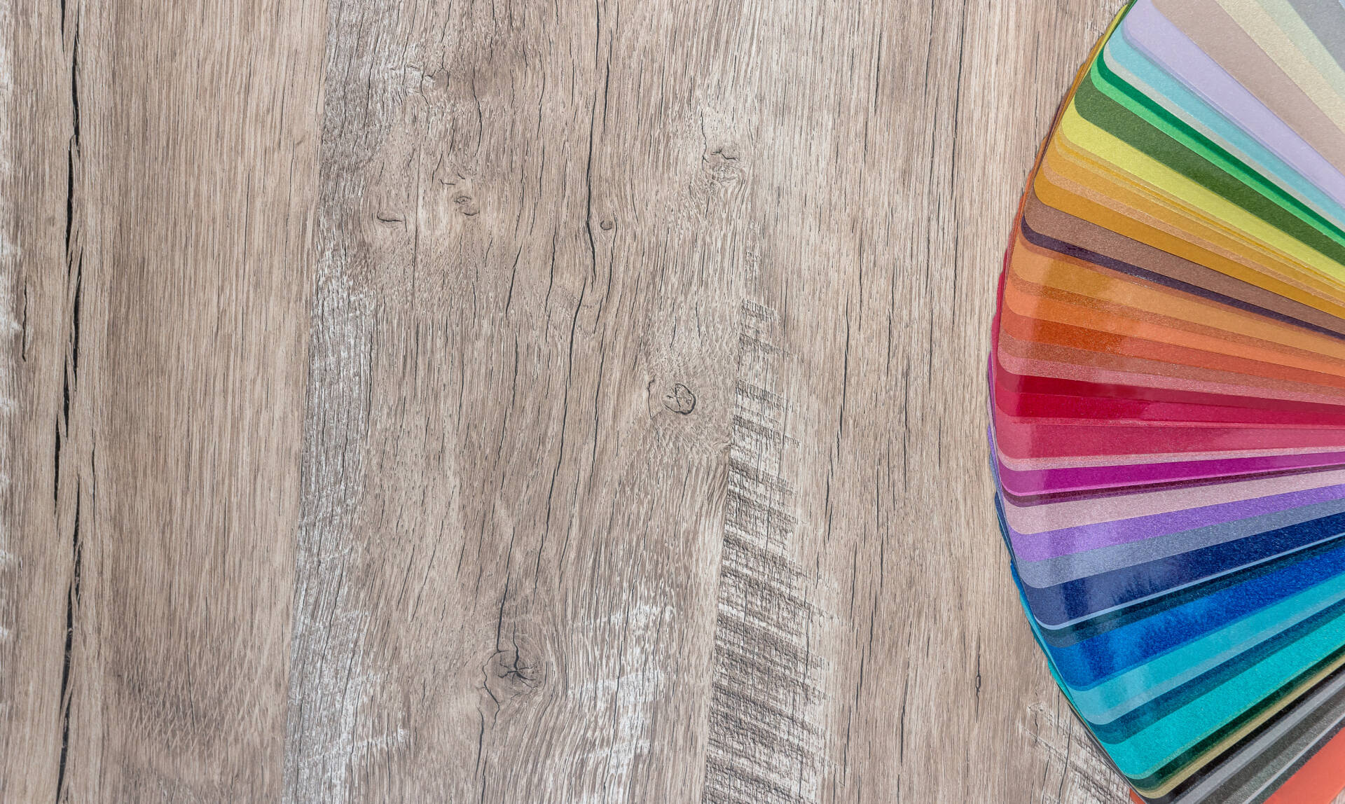 fan colour spectrum on wooden background colour foils choice
